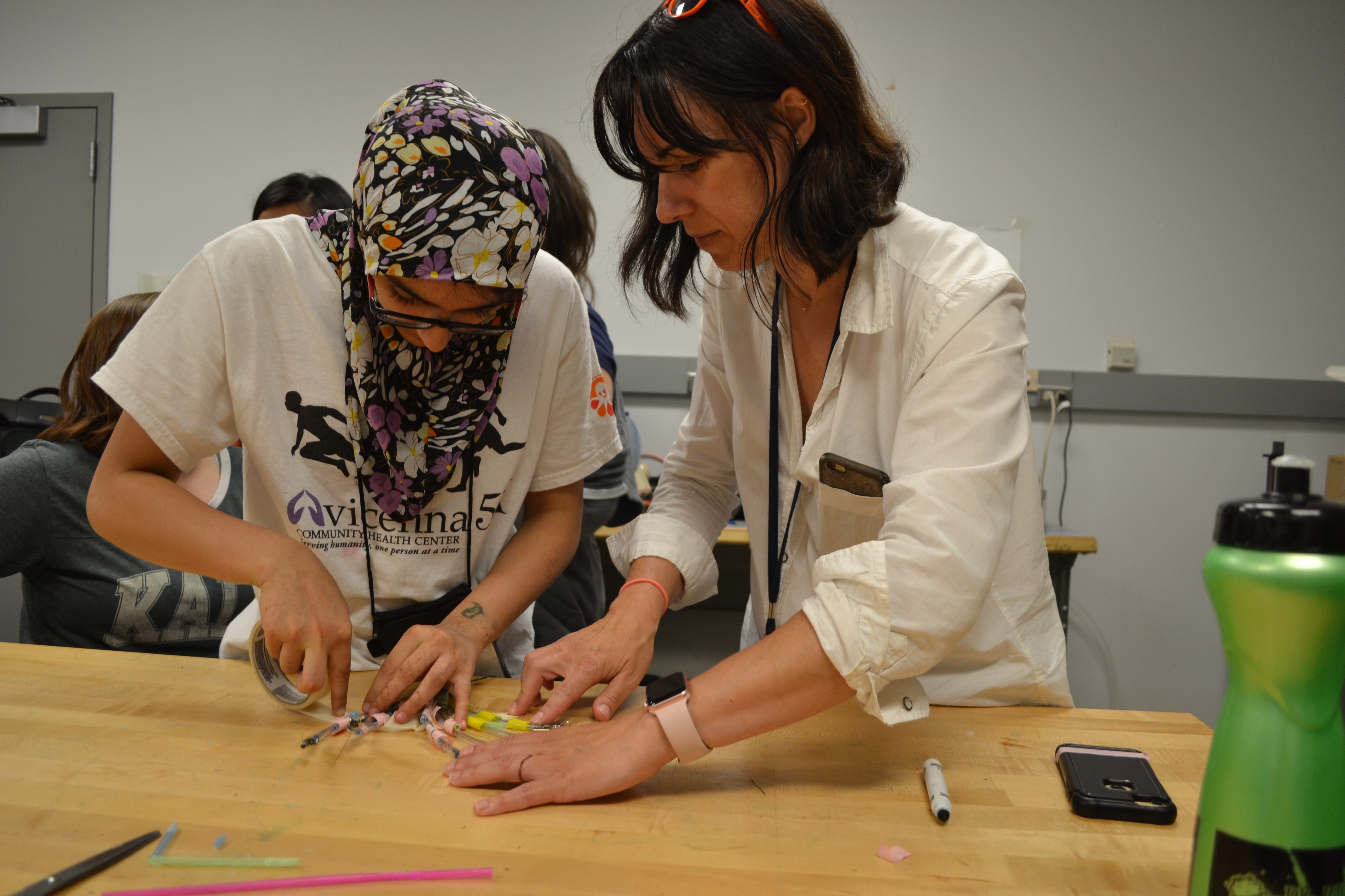 Student and TA working together in the lab 