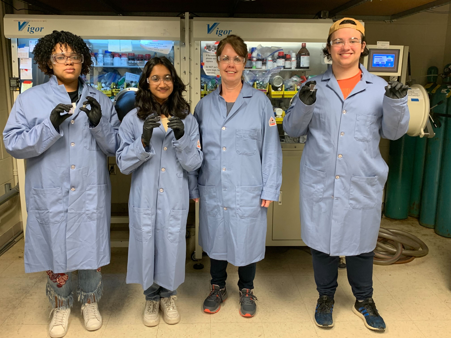 Young Scholars students with mentor in lab