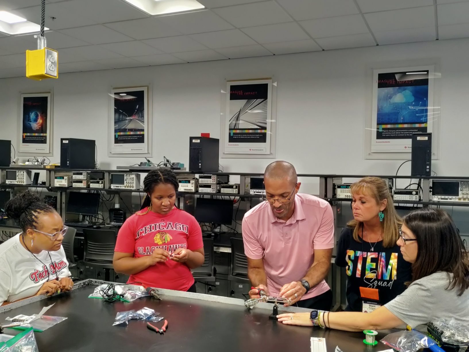 Teachers learning soldering at the 2023 CISTEME365 Summer Institute