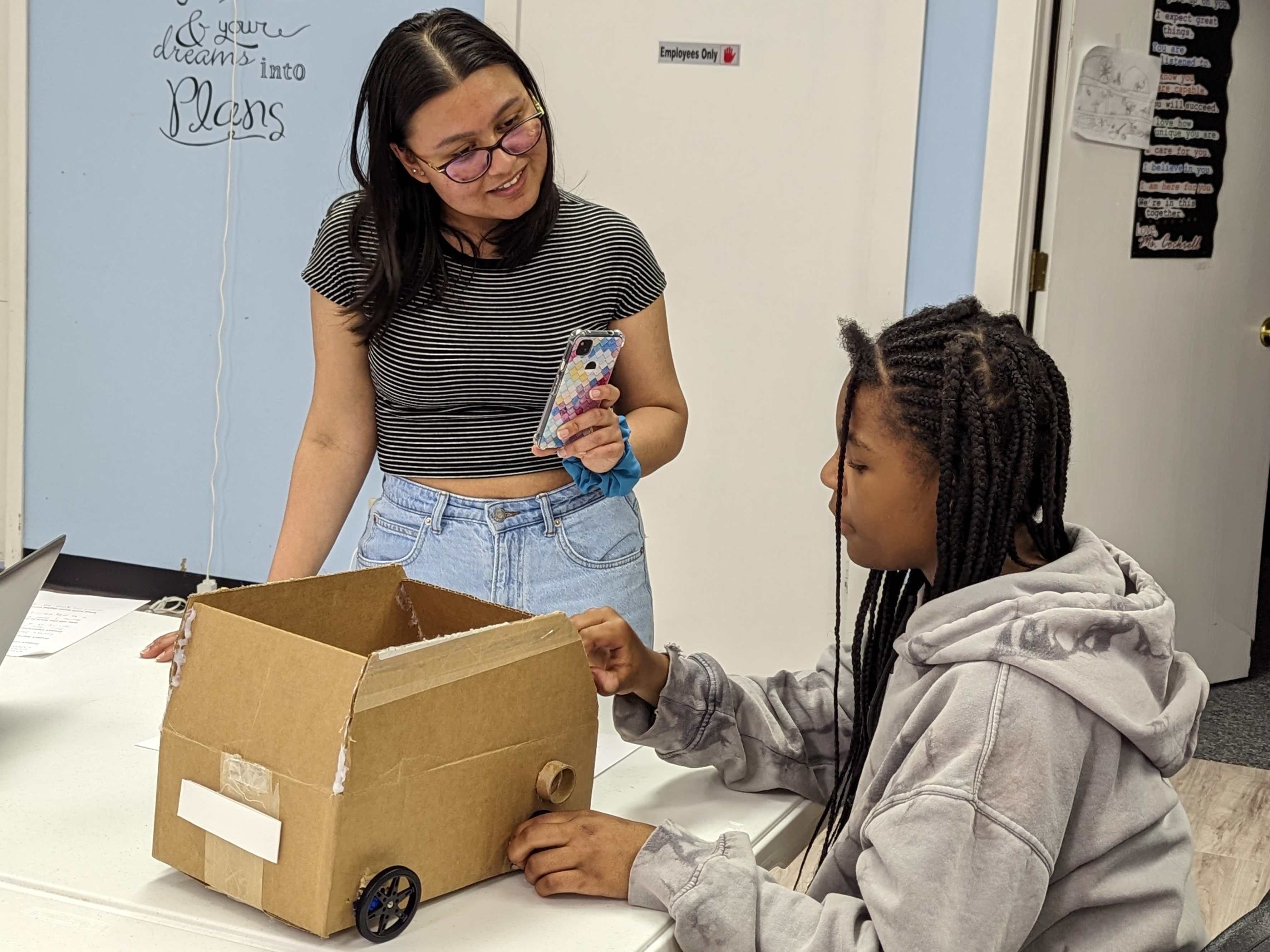 Student and mentor working on a STEM Activity at The Well Experience for Girls To Life